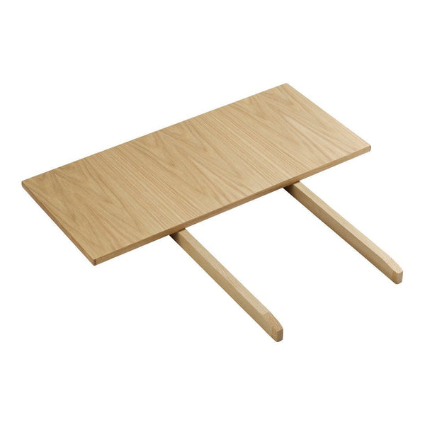 Light oak wood tabletop with a smooth finish and minimalist design. Simple, natural look for modern decor.