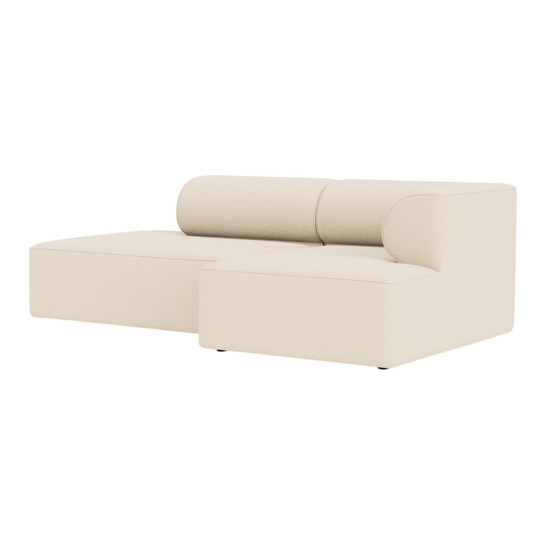 Beige sectional sofa with smooth upholstery and modern, minimalist design.