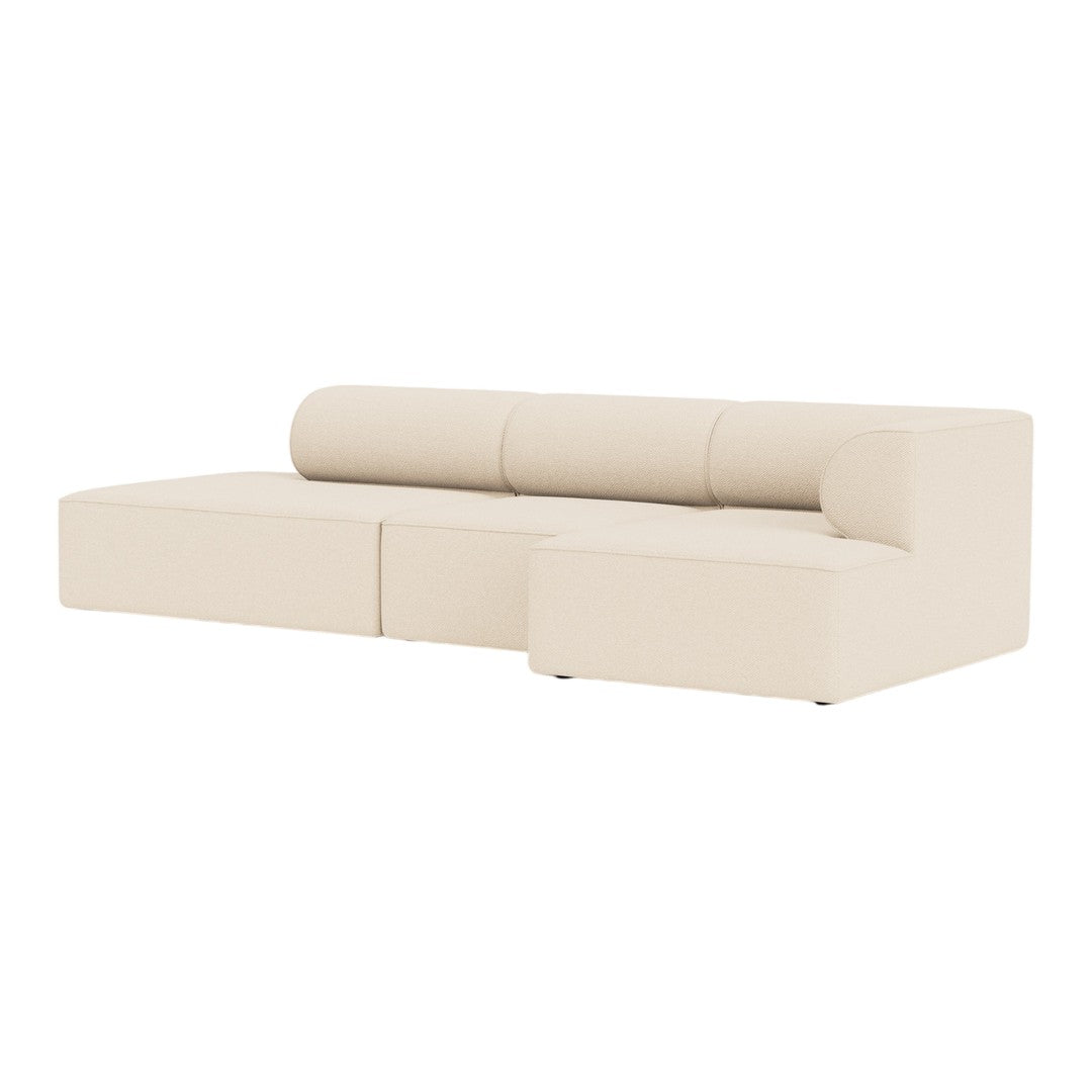 Beige modern sectional sofa with smooth, minimalist design and round cushions. Ideal for contemporary living spaces.