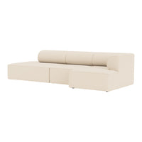 Beige modern sectional sofa with smooth, minimalist design and round cushions. Ideal for contemporary living spaces.
