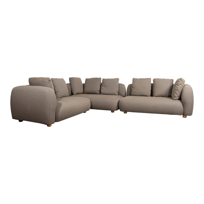 Taupe sectional sofa with smooth fabric, oversized cushions, and rounded arms, perfect for cozy living spaces.