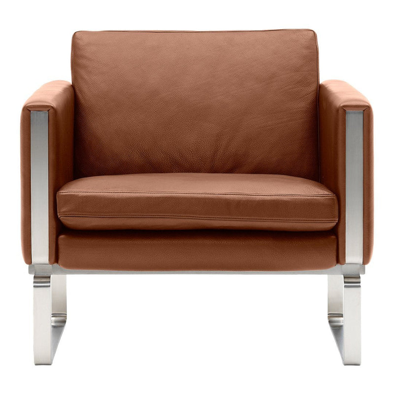 Brown leather armchair with sleek silver metal accents and minimalist design, ideal for modern interiors.