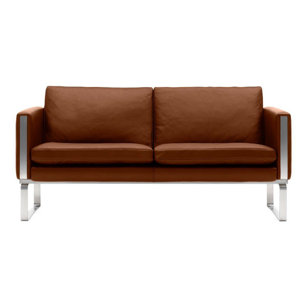 Brown leather two-seater sofa with sleek silver metal legs, featuring a minimalist design and smooth upholstery.