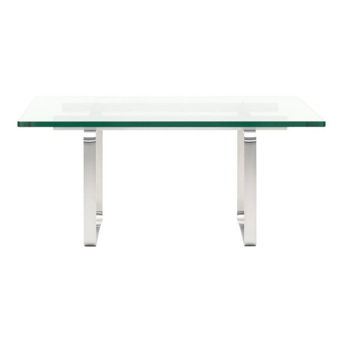 Clear glass table with sleek chrome legs, featuring a minimalist design and modern elegance. Perfect for contemporary spaces.