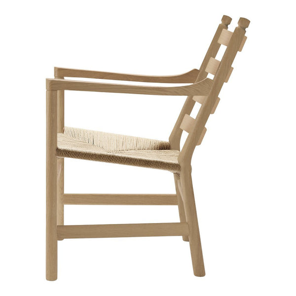 Beige wooden chair with woven natural seat, featuring a minimalist design and clean lines. Ideal for modern decor.