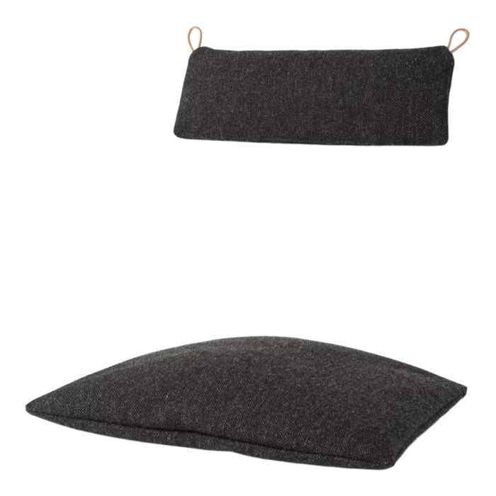 Stylish dark gray cushion with a smooth texture and minimalistic design, perfect for modern decor.