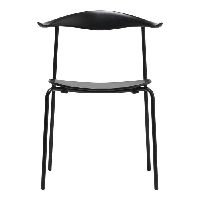Sleek black chair with smooth surfaces and minimalist design, perfect for modern decor.