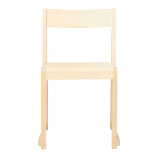 Light beige wooden chair with a minimalist design, featuring a smooth, solid finish and clean lines.