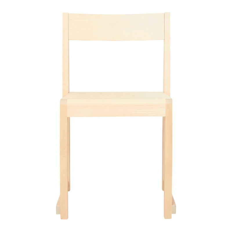 Light beige wooden chair with a minimalist design, featuring a smooth, solid finish and clean lines.