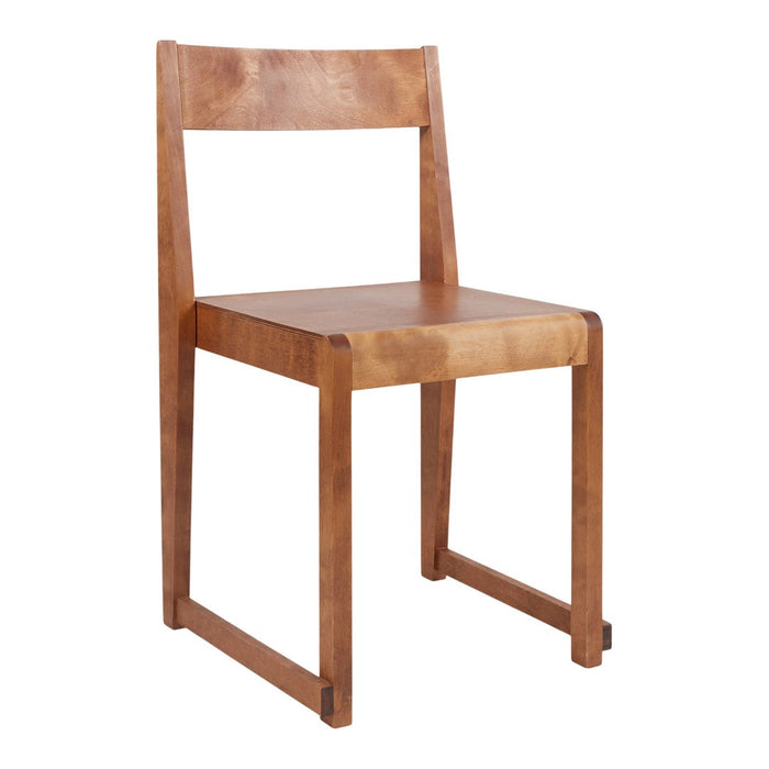 "Light brown wooden chair with a minimalist design and smooth finish, showcasing natural wood grain patterns."