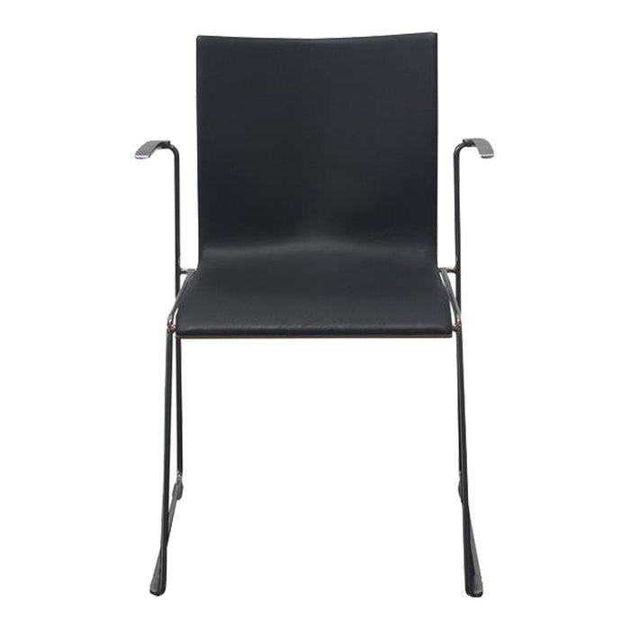 Sleek black chair with minimalist design and smooth finish, featuring a simple, modern pattern.