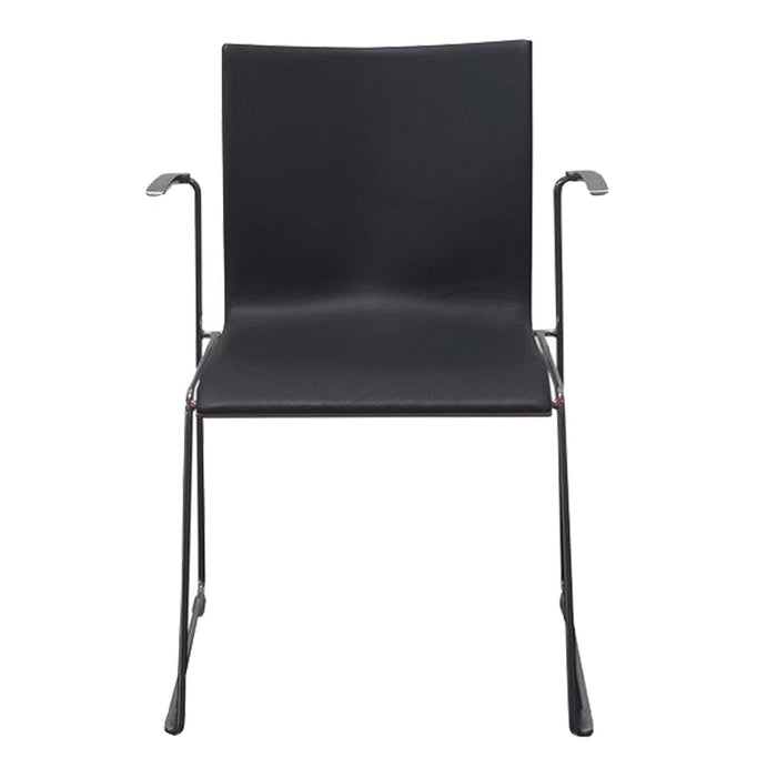Modern black chair with minimalist design and sleek metal arms, perfect for contemporary spaces.
