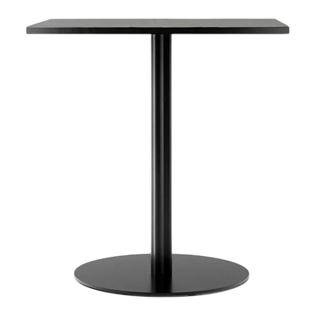 Black round table with a sleek, minimalist design and a solid black top. Perfect for modern decor.