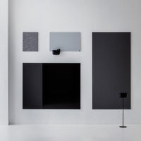 Modern wall panels in black, gray, and textured patterns; sleek design for contemporary interiors.