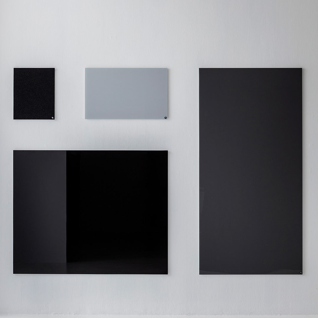 Modern wall art featuring a sleek black and gray color palette with various geometric shapes.