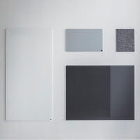 Collection of modern panels in light gray, dark gray, white, and textured patterns against a neutral background.