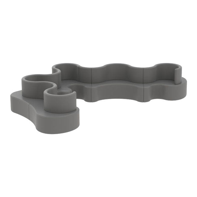 Gray, wavy-shaped pet feeding mat with a smooth, matte finish, designed for modern aesthetics.