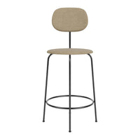 Tan fabric stool with a minimalist design and sleek black metal legs, perfect for modern spaces.
