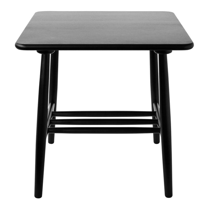 Black square side table with sleek legs and minimalist design, perfect for contemporary decor.