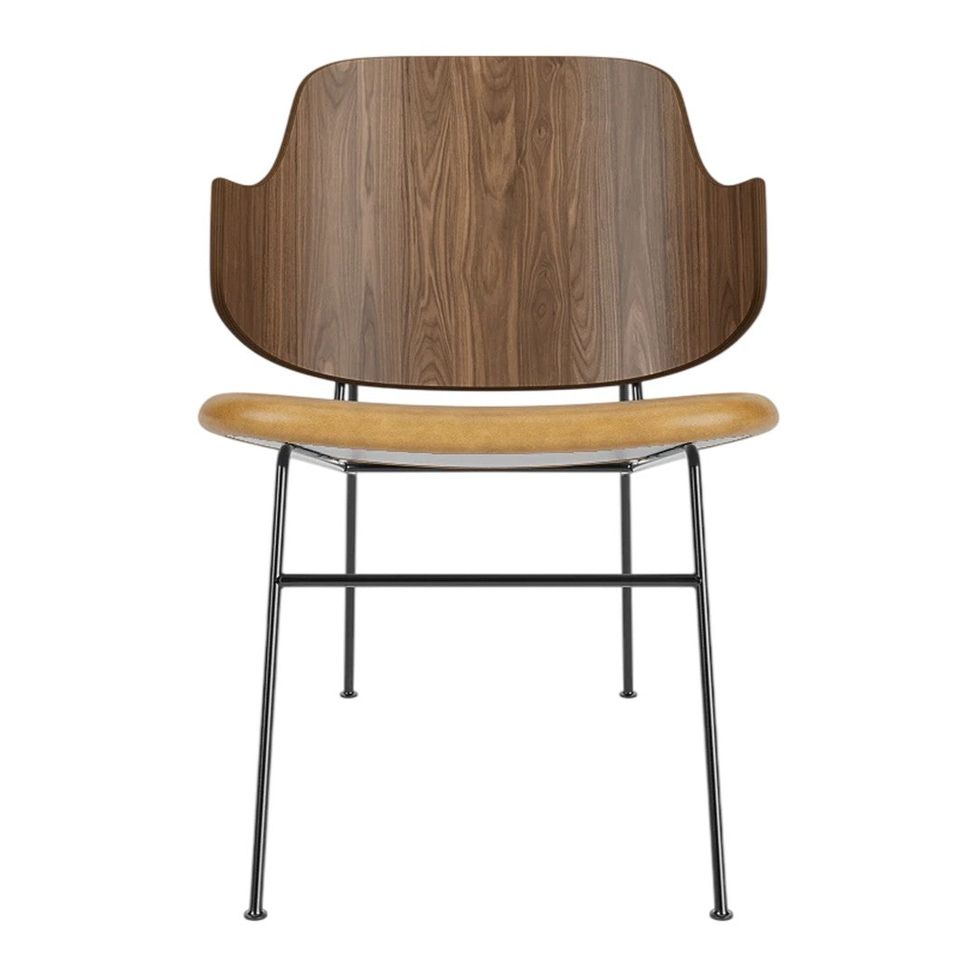 Modern chair featuring a walnut wood backrest, caramel seat, and sleek black metal legs. Perfect blend of colors and textures.