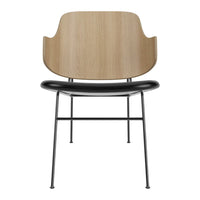 Modern chair featuring a light wood backrest, sleek black seat, and minimalist metal legs for a contemporary look.