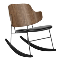 "Modern rocking chair with a walnut wood backrest, black seat, and sleek metal frame, featuring a minimalist design."