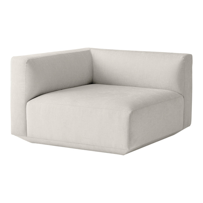 Modern cream-colored corner sofa with a minimalist design and smooth, solid fabric texture.