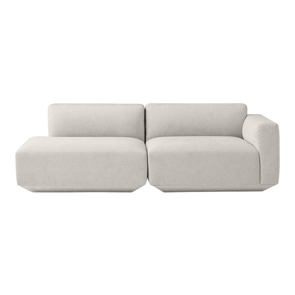 Light gray modular sofa with a sleek, modern design and soft, textured fabric. Perfect for contemporary living spaces.
