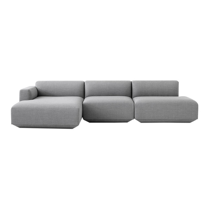 Minimalist gray sectional sofa with smooth, modern lines and a rectangular shape, perfect for contemporary decor.