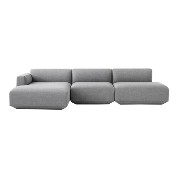 Modern gray sectional sofa with a sleek design and smooth, minimalist pattern. Perfect for contemporary living spaces.
