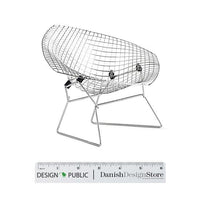 "Modern wire chair in chrome finish with a minimalist design, featuring a sleek, curved silhouette."
