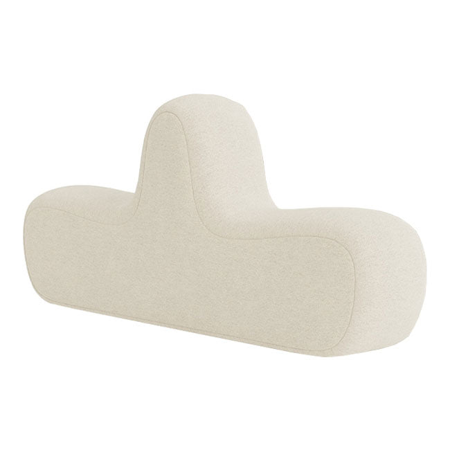 Beige abstract-shaped cushion with a soft, textured fabric and minimalistic design, perfect for modern decor.
