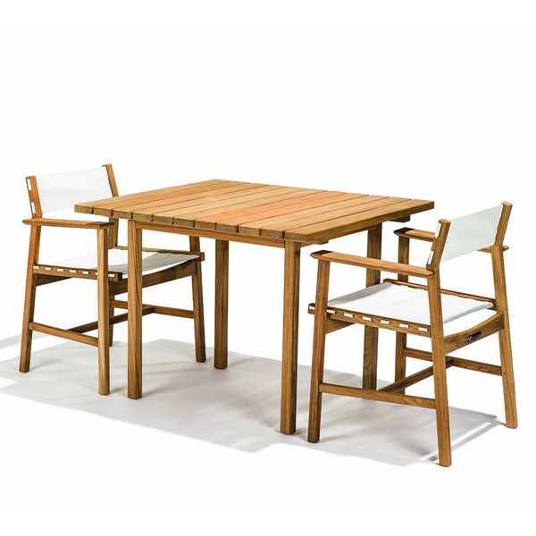 Natural wood table with light beige seats, featuring a sleek, minimalist design and clean lines.