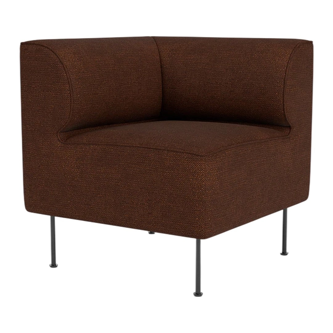 Brown upholstered corner chair with a textured fabric and minimalist black metal legs. Perfect for modern decor.