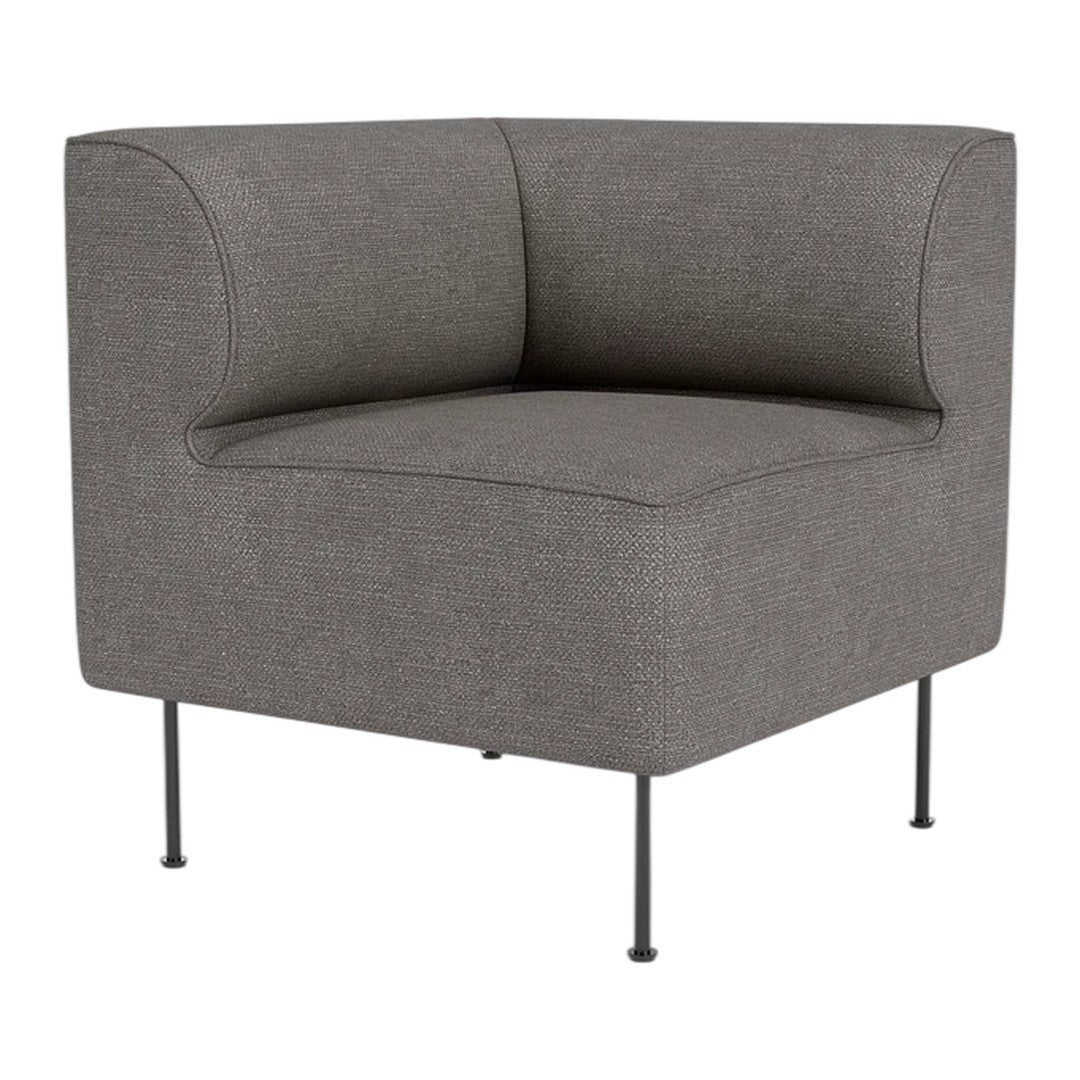 Gray upholstered corner chair with clean lines and minimalistic design, featuring a solid pattern and metal legs.