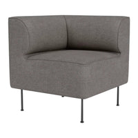 Gray upholstered corner chair with clean lines and minimalistic design, featuring a solid pattern and metal legs.
