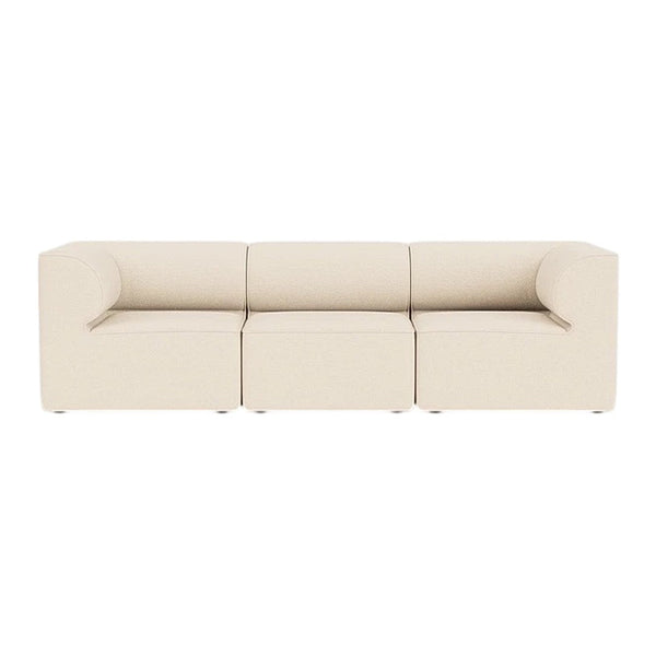 Creamy beige modular sofa with smooth, minimalist design and no visible patterns, perfect for modern decor.