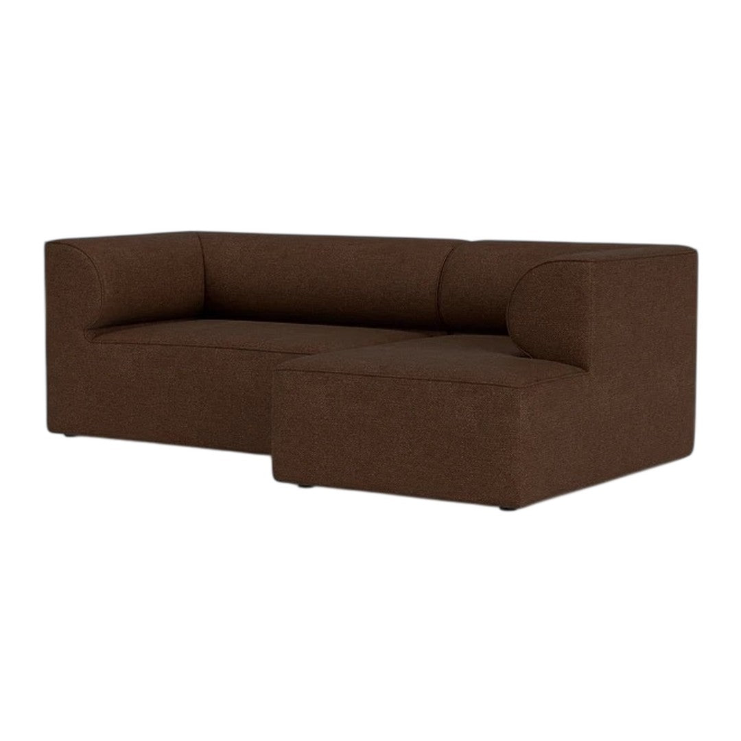 Brown sectional sofa with a sleek, modern design and smooth fabric texture, perfect for contemporary living spaces.