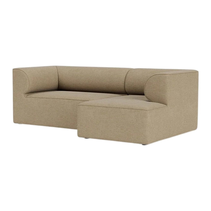 Beige upholstered sectional sofa with a modern, minimalist design and smooth texture.