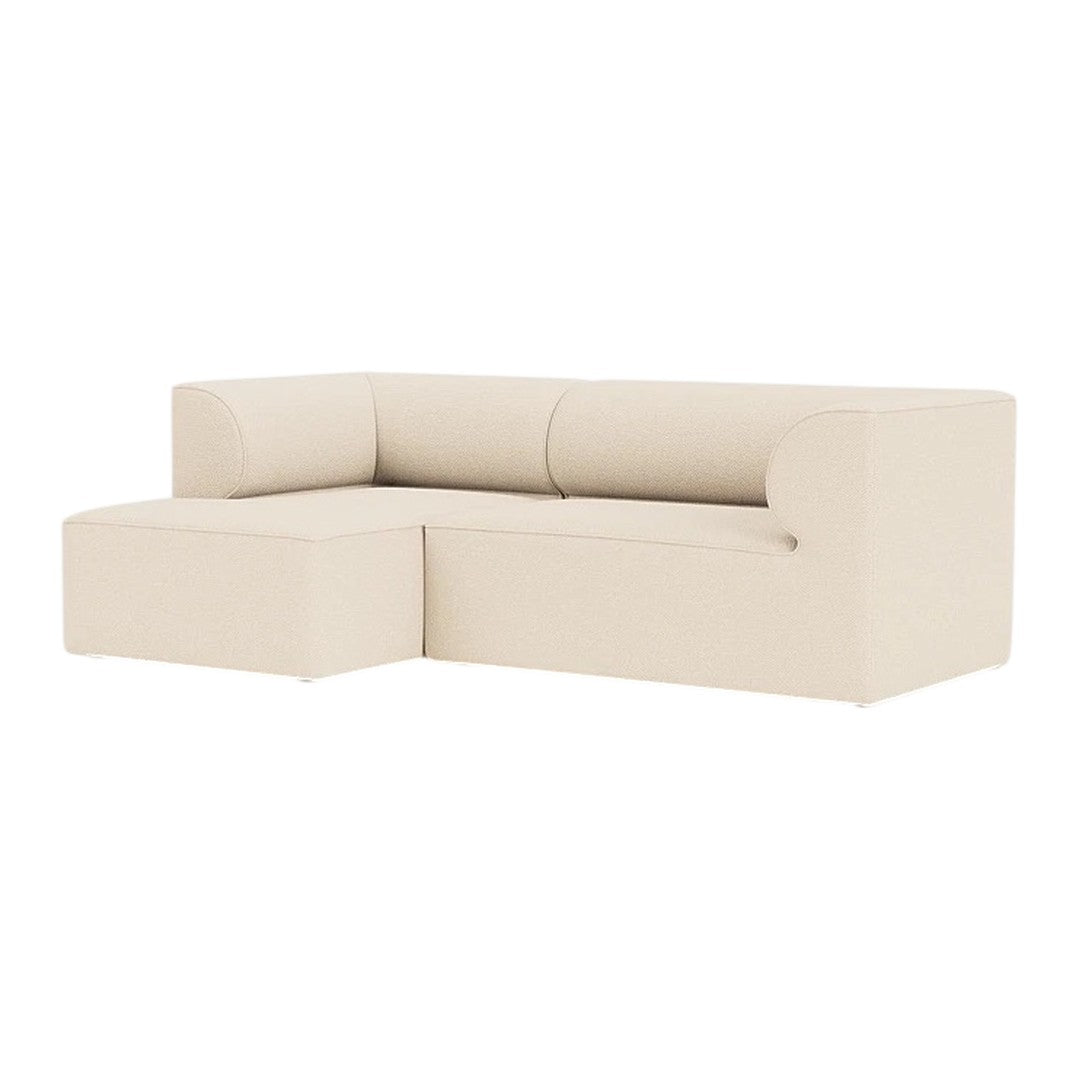 Beige sectional sofa with smooth, minimalist design and subtle curves, perfect for modern living spaces.
