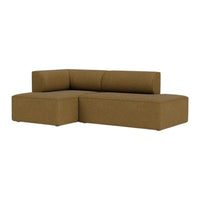 Brown sectional sofa with a smooth, textured finish, featuring sleek lines and a minimalist design. Perfect for modern decor.