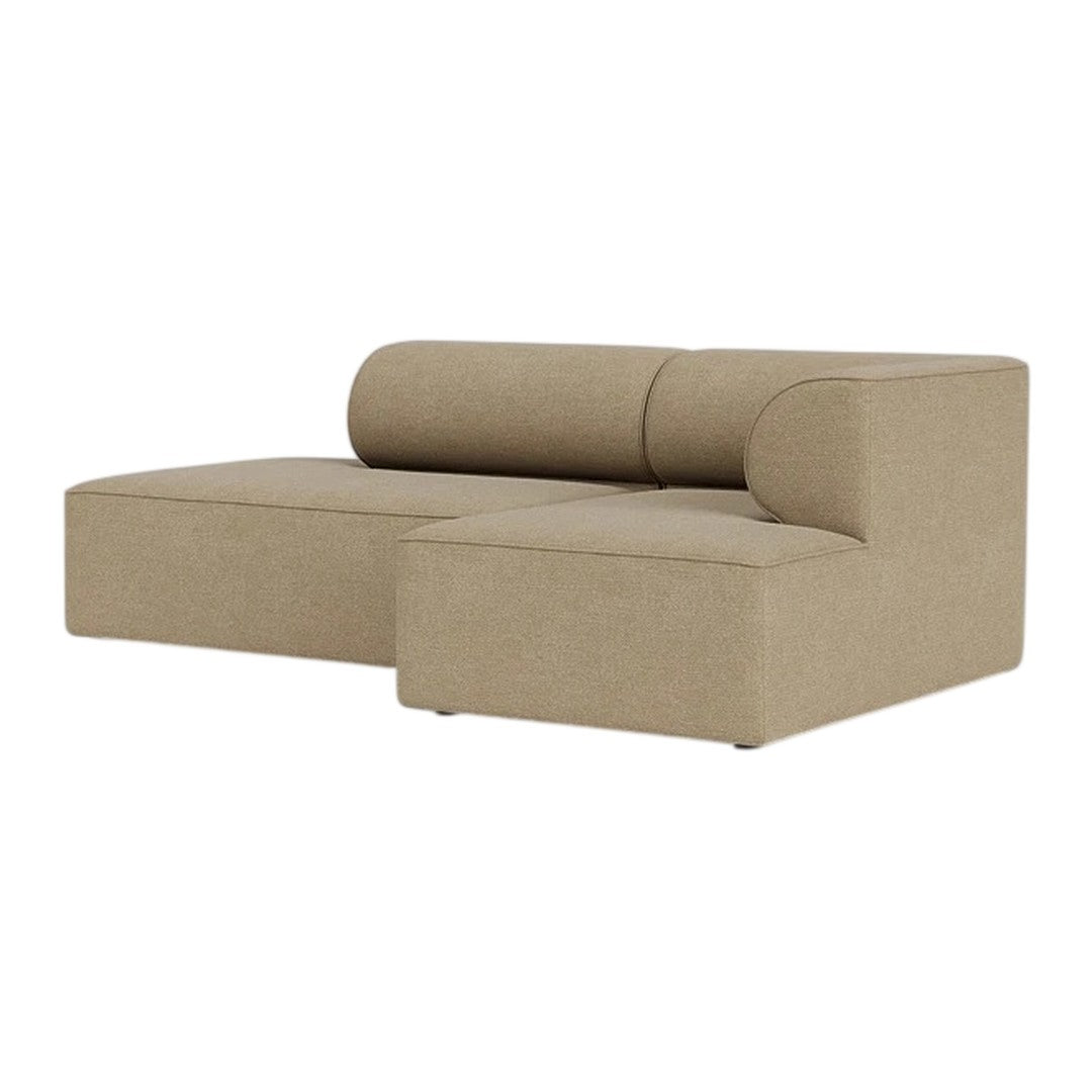 Beige fabric sectional sofa with a smooth texture and minimalist design. Perfect for modern living spaces.