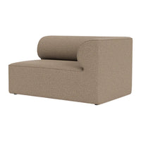 Gray sectional sofa with a textured pattern, featuring a modern design and smooth curves. Ideal for contemporary spaces.