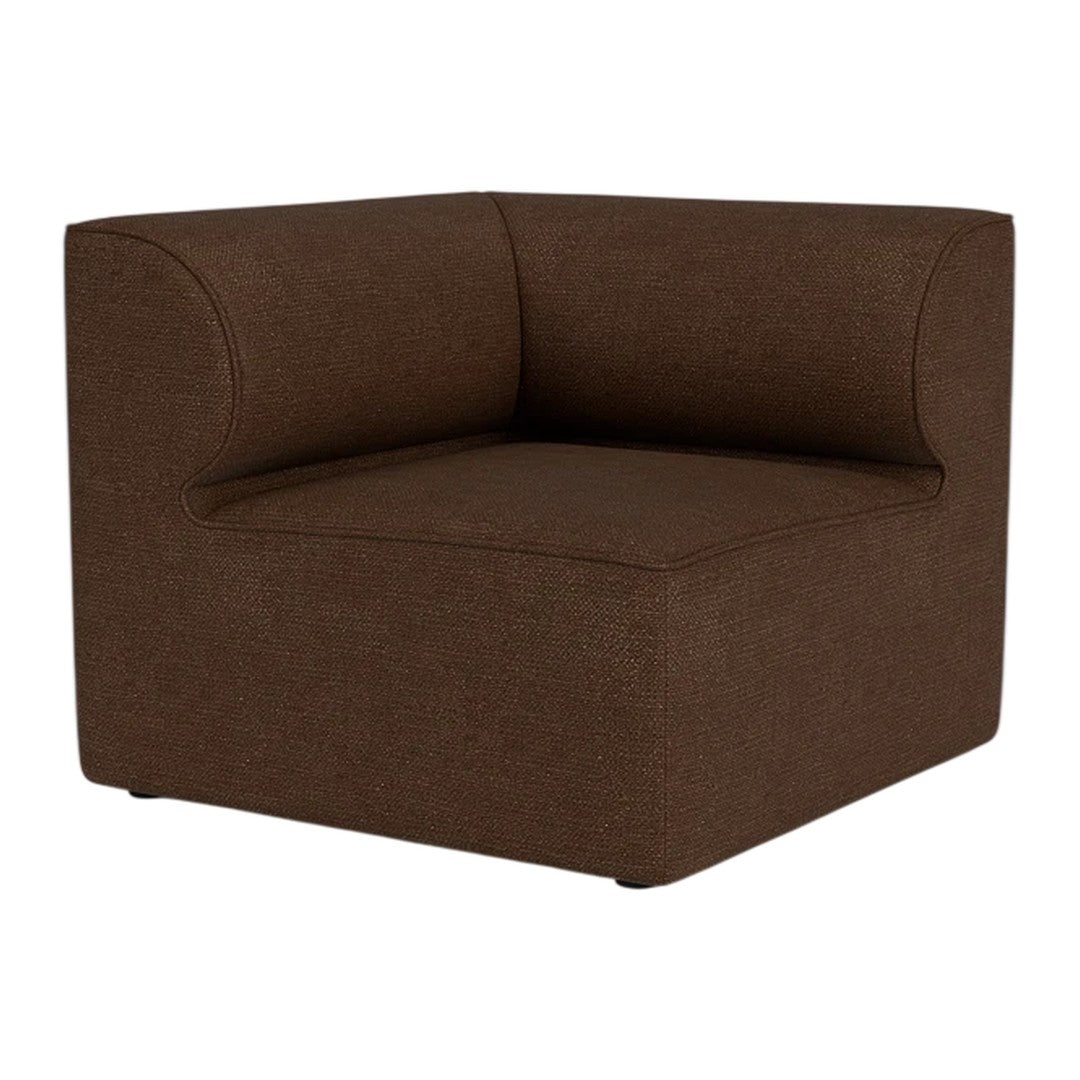 "Brown upholstered corner chair with a smooth, modern design and subtle textured fabric pattern."