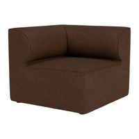 "Brown upholstered corner chair with a smooth, modern design and subtle textured fabric pattern."