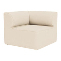 Olive green upholstered armchair with a minimalist design and smooth, curved armrest.