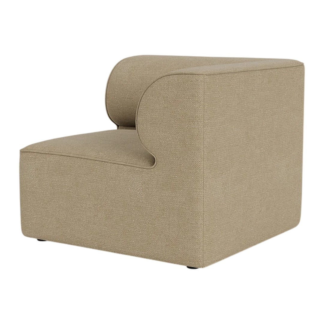 Light beige chair with a smooth, textured fabric and a modern, minimalist design. Ideal for contemporary decor.