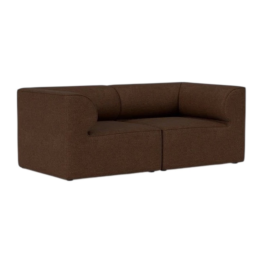 Gray textured sofa with a minimalist design, featuring a soft, speckled pattern and clean lines. Perfect for modern decor.