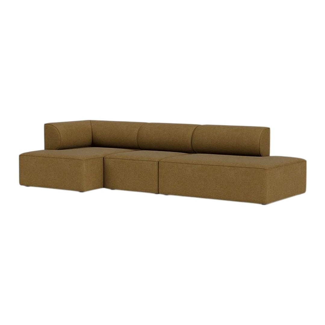 Modern L-shaped sofa in rich brown fabric, featuring sleek lines and a minimalist design. Ideal for stylish interiors.