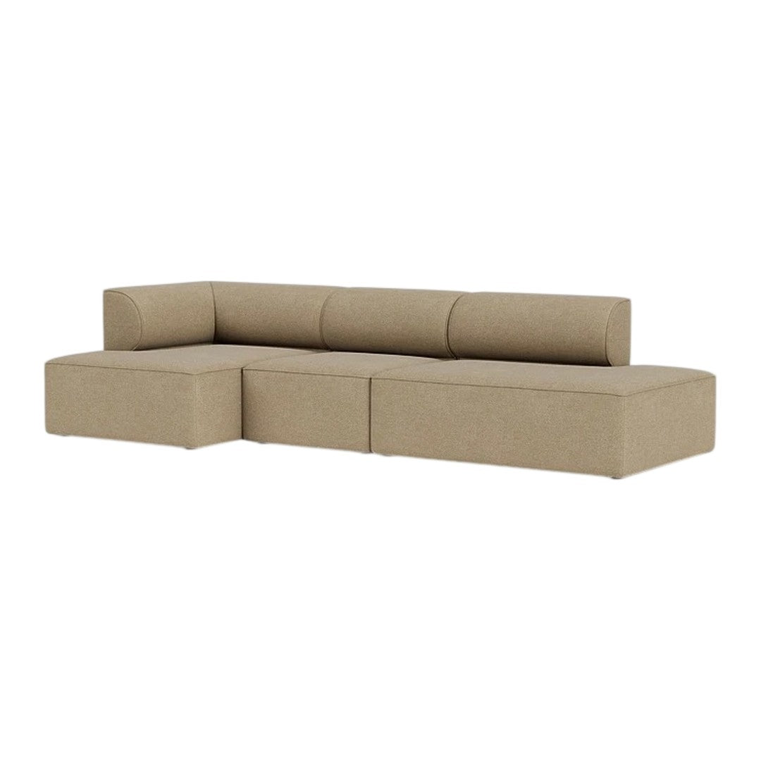 Beige sectional sofa with a modern design featuring clean lines and a smooth fabric texture. Ideal for any living space.